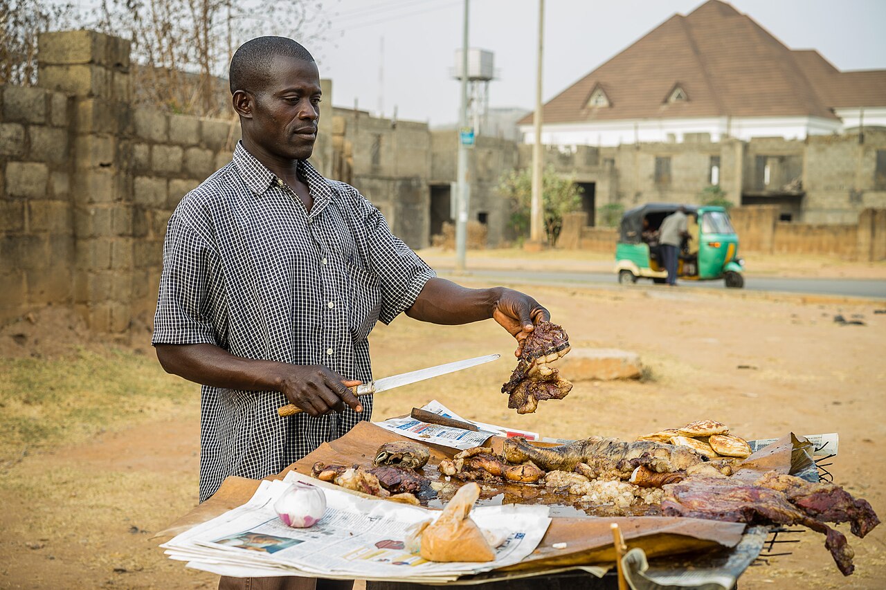 Suya — grilled skewered meat is a good lean protein choice when eating out; ask for a smaller portion